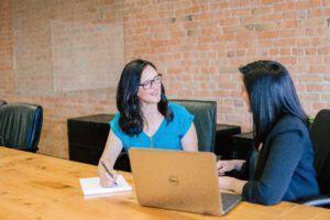 woman talking to a property manager